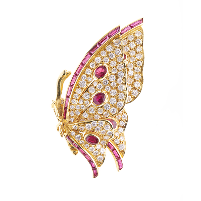 Broche Mariposa de oro amarillo, diamantes y rubíes