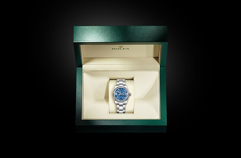 Reloj Rolex Datejust 31 esfera azul azzurro, motivo floral, engastada de diamantes en su estuche Grassy